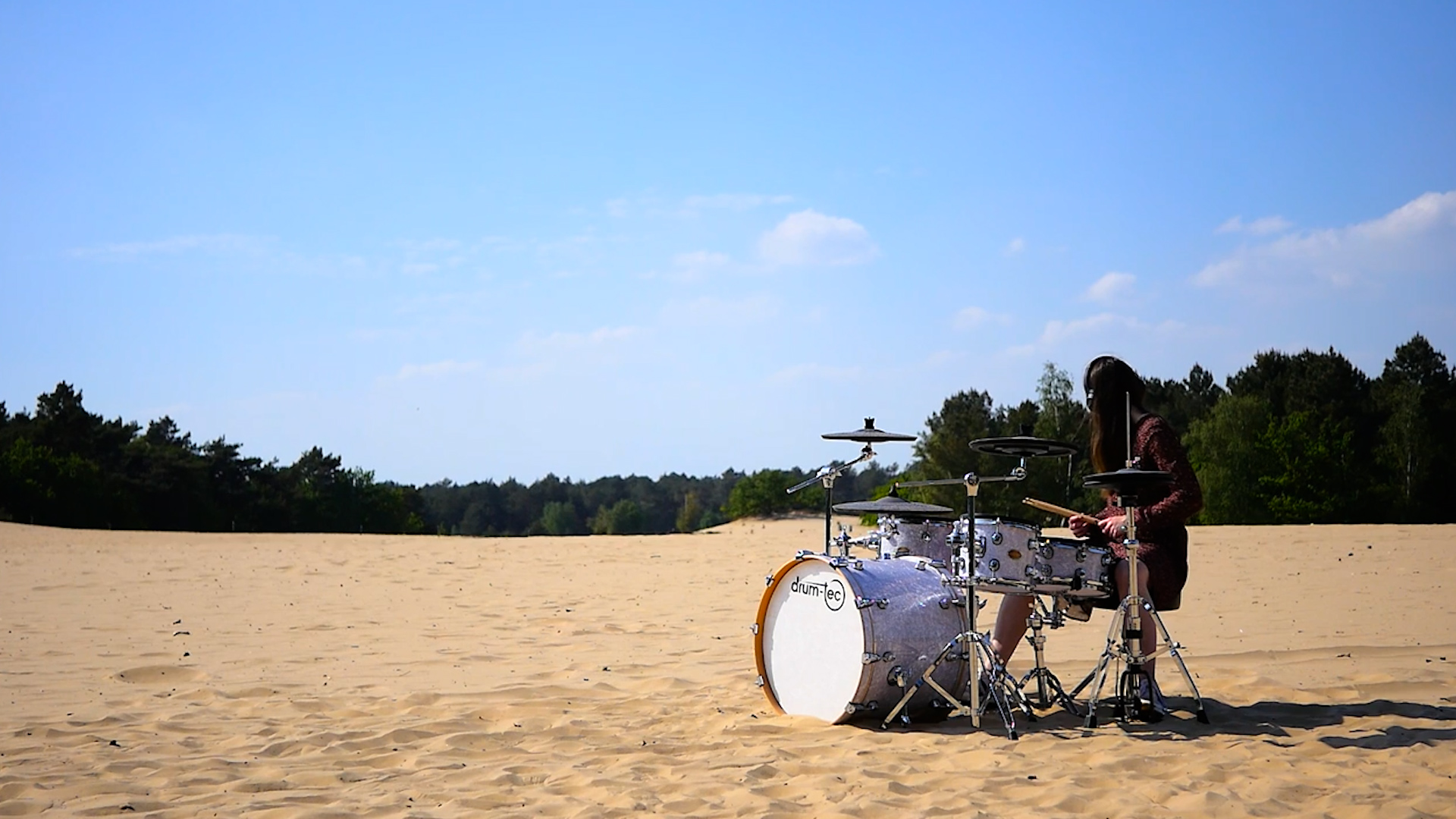 A drum kit set up outdoors